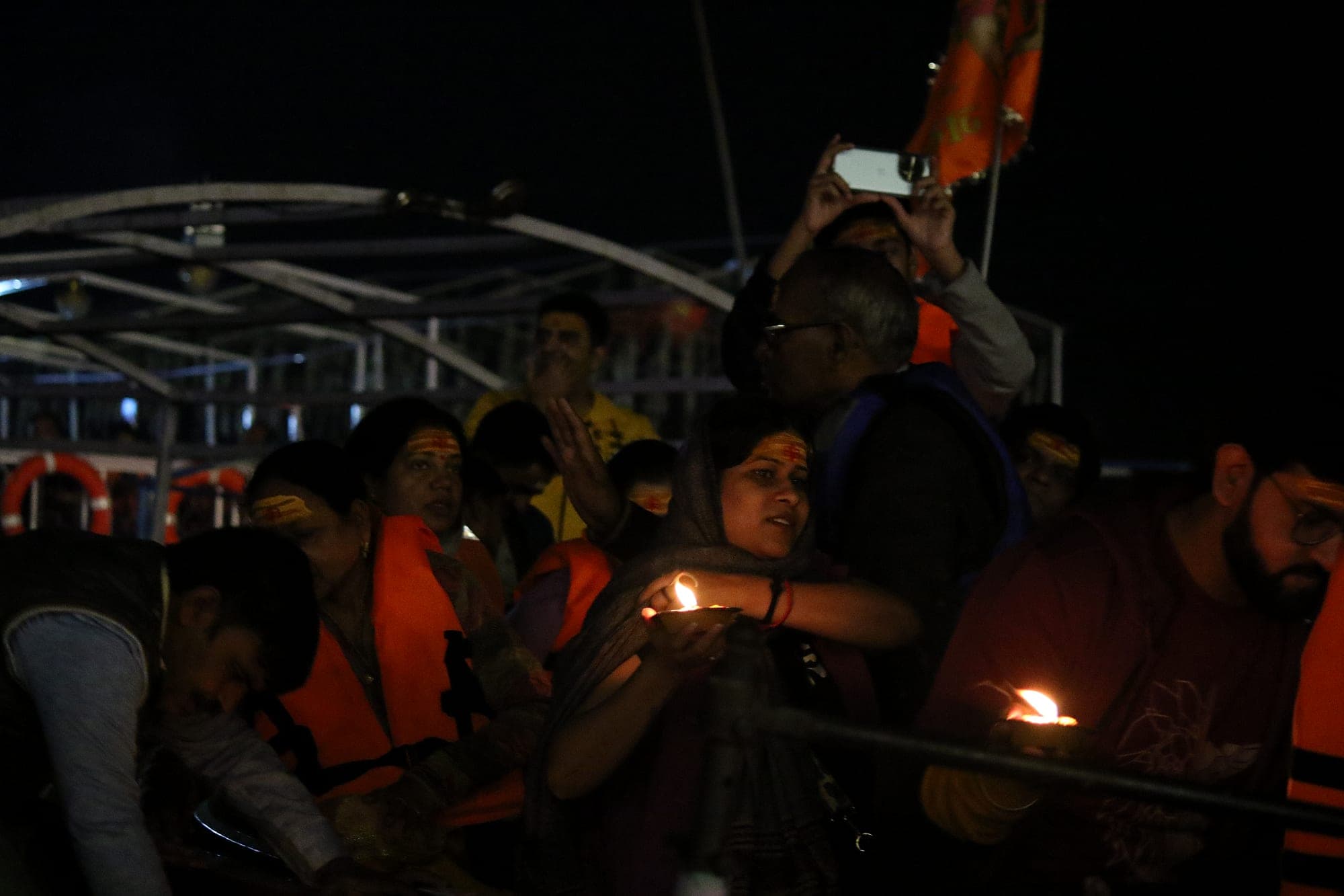 Lamps held aloft during the Ganga Aarti at Varanasi