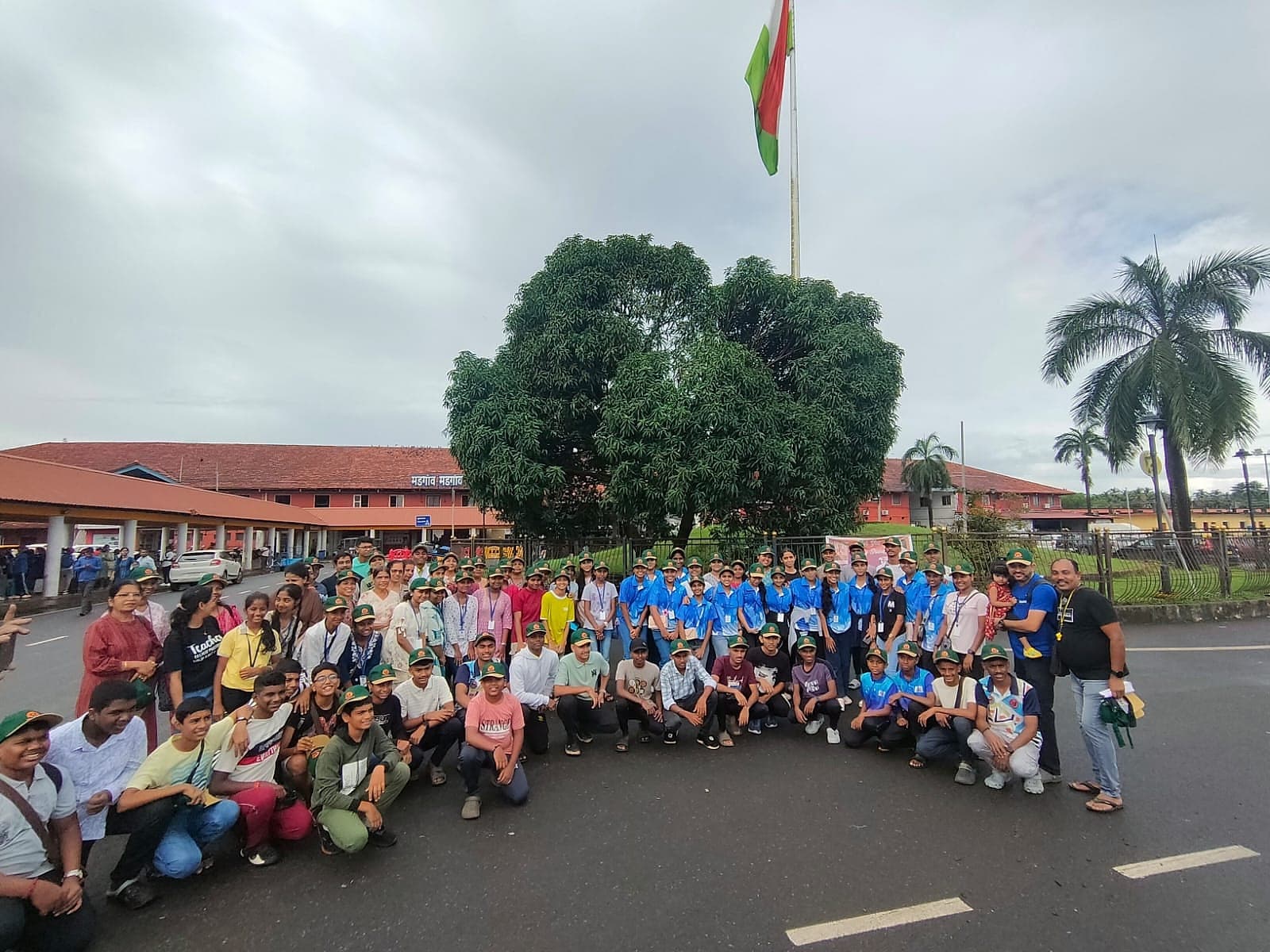 Uniformed students and their teachers gathered at the start of a tour